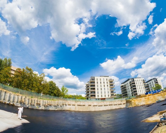 Apartments in Bratislava - spraying bitumen insulation